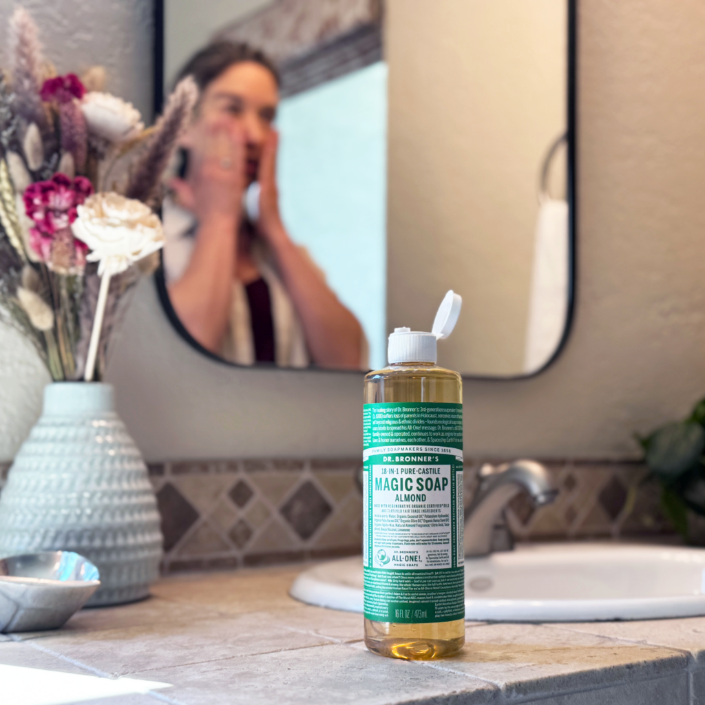 Someone washing their face with Magic Soap.