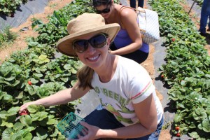 Lisa picking berries at her CSA