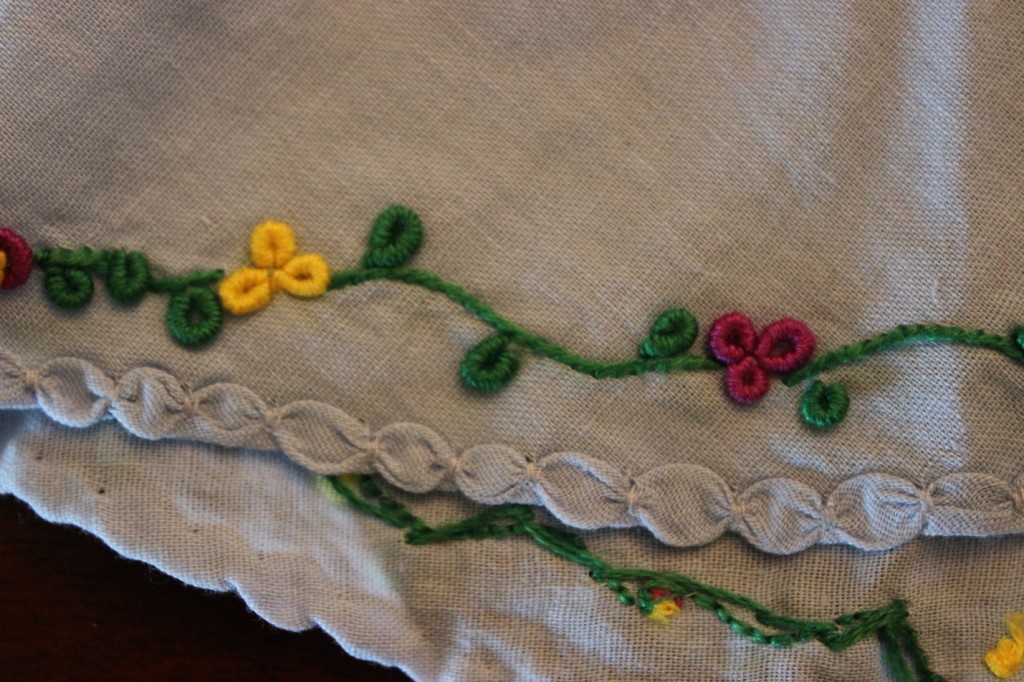 intricate embroidered infant dress