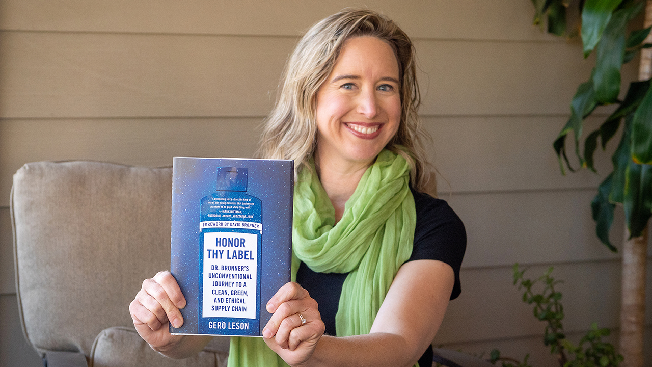honor thy label - Lisa holding book