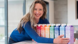 Lisa with the 8 Magic Soap Castile scents in the Refill Cartons.