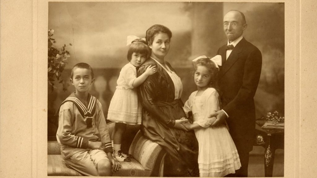 Formal black and white portrait of a family of 5. - history of Dr. Bronner's