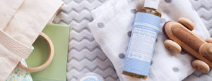 Dr. Bronner's Baby Unscented Castile Soap with baby items.