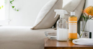Body Wash Spray made with Castile Soap sitting on a bedside table