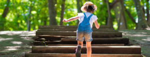 Girls walking up steps - 10 steps to going green - living low tox