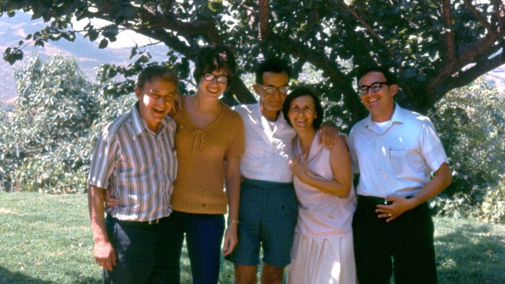 Bronner family under a shady tree - creating company's guiding cosmic principles
