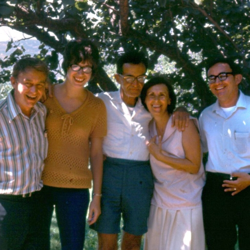 Bronner family under a shady tree - creating company's guiding cosmic principles