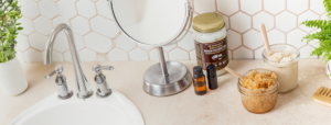 GIY Sugar scrub in jars sitting on bathroom counter