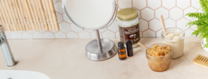GIY Sugar scrub in jars sitting on bathroom counter