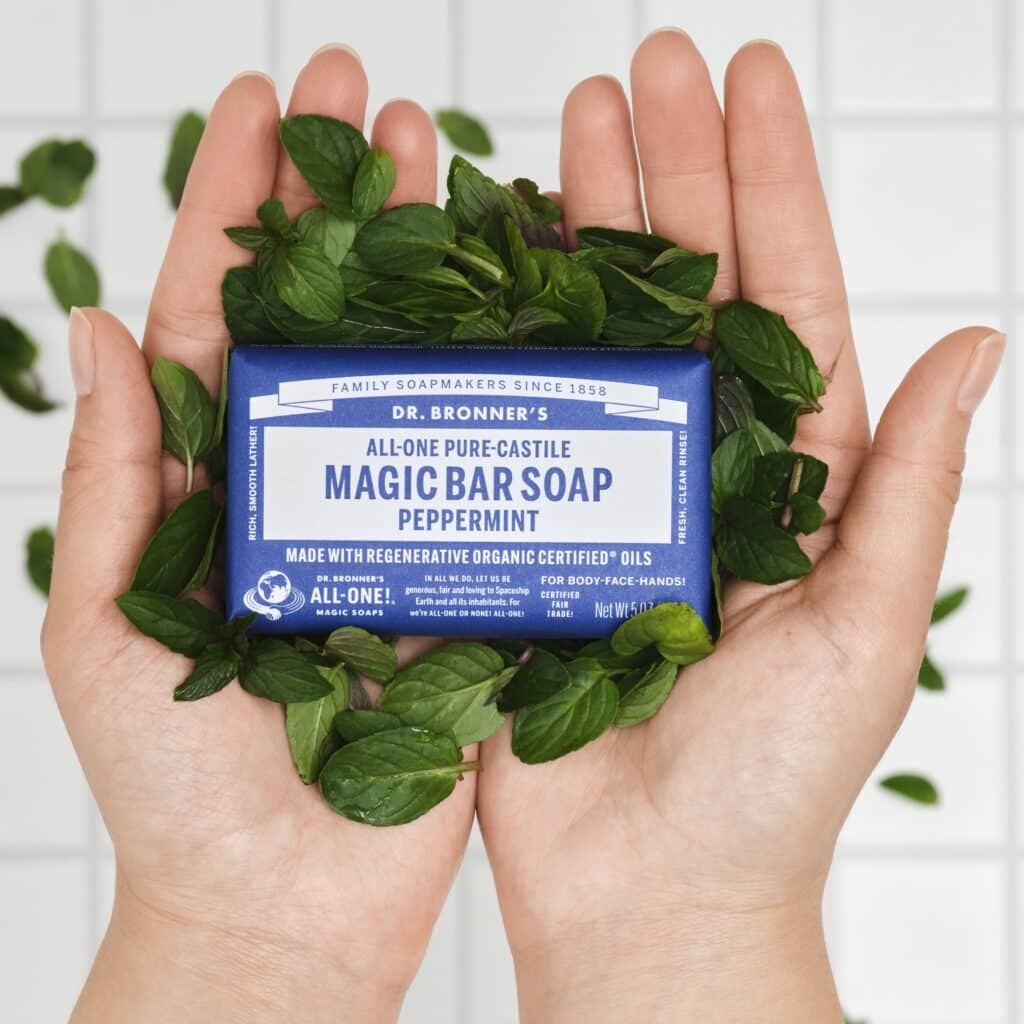hands holding Peppermint Magic Bar Soap