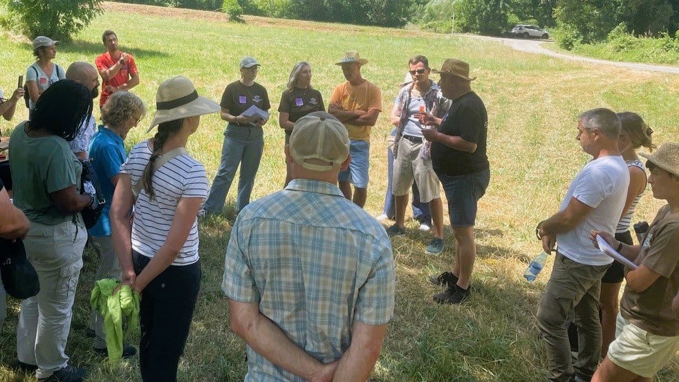 Distillerie Bleu Provence Founder Philippe Soguel leads the discussion in our circle of lavender farmers, Dr. Bronner’s Special Ops team plus Michael and me (in the striped shirt).