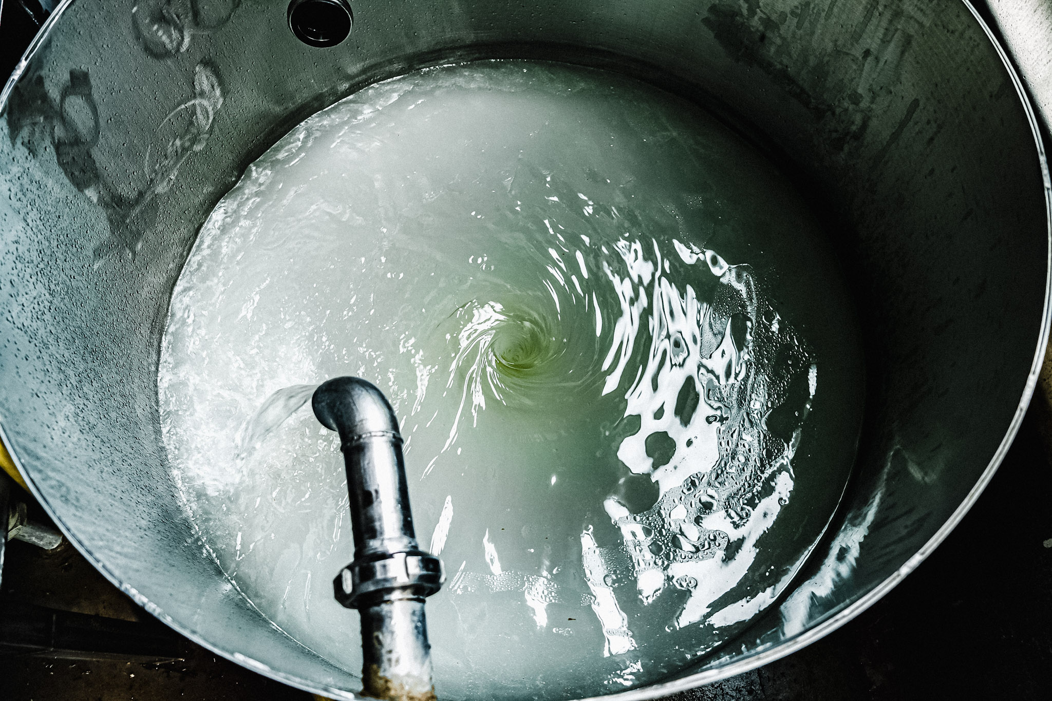The oil/water liquid then drains from the condenser coils down into a collection tank in the cellar.