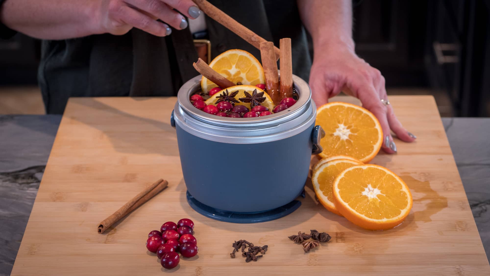 Lisa making a simmer pot.