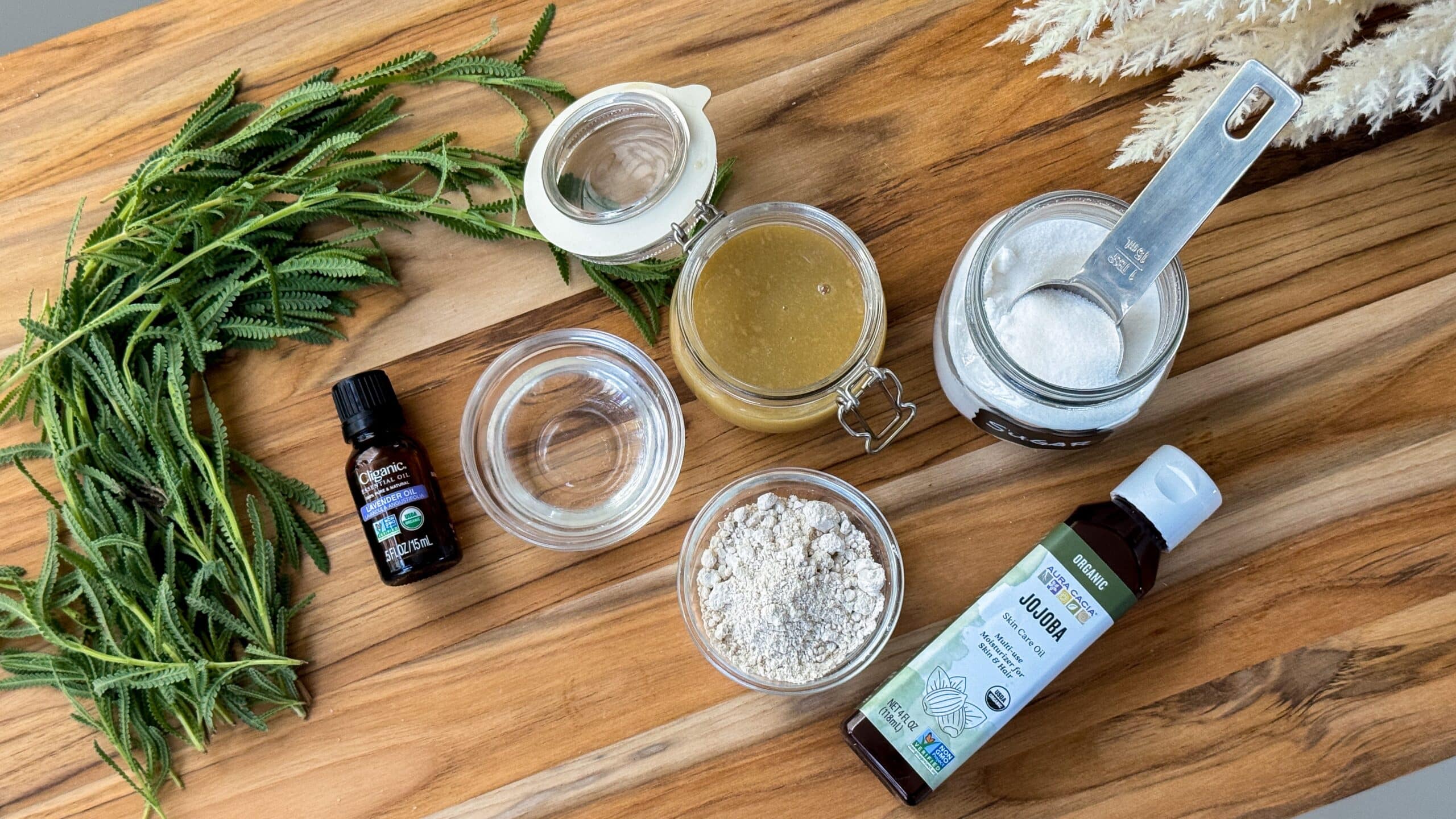 Ingredients for neutral scalp scrub including glycerin, colloidal oatmeal, jojoba oil, white sugar, and lavender essential oil.