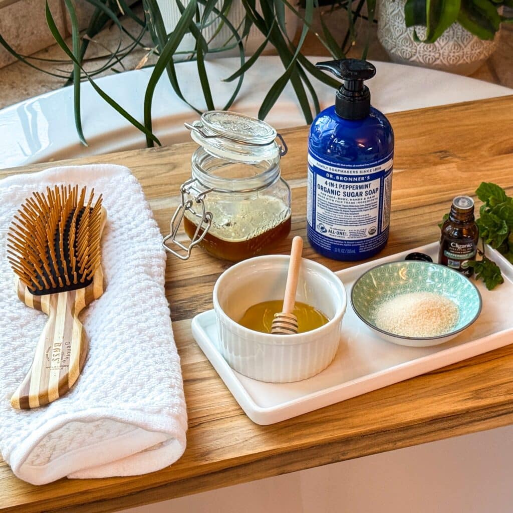 Scalp scrub ingredients out on a board